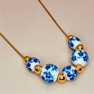 Handcrafted Gold and Blue Floral Porcelain Bead Dainty Rope Necklace